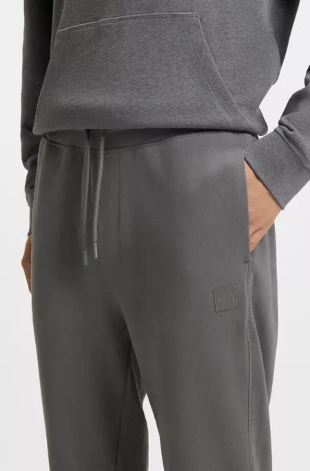 Cotton-terry tracksuit bottoms with logo patch