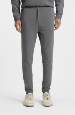 Cotton-terry tracksuit bottoms with logo patch, Grey