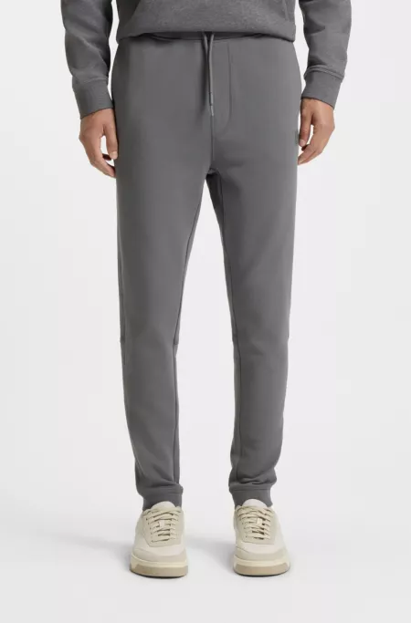 Cotton-terry tracksuit bottoms with logo patch