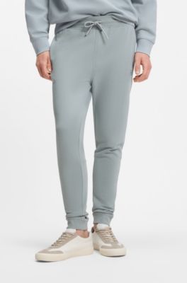 Cotton-terry tracksuit bottoms with logo patch, Light Grey