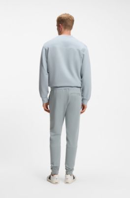 Cotton-terry tracksuit bottoms with logo patch, Light Grey
