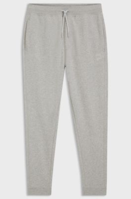 Cotton-terry tracksuit bottoms with logo patch, Light Grey