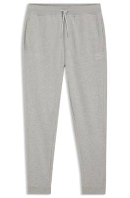 Cotton-terry tracksuit bottoms with logo patch 1