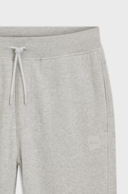 Cotton-terry tracksuit bottoms with logo patch, Light Grey