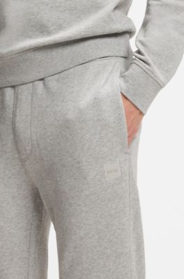 Cotton-terry tracksuit bottoms with logo patch, Light Grey