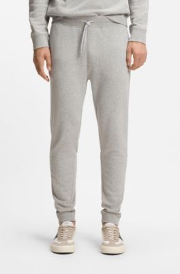 Cotton-terry tracksuit bottoms with logo patch, Light Grey