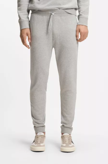 Pantalones de chándal en felpa de algodón con aplique de logo