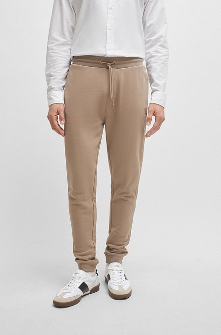 Cotton-terry tracksuit bottoms with logo patch, Light Brown