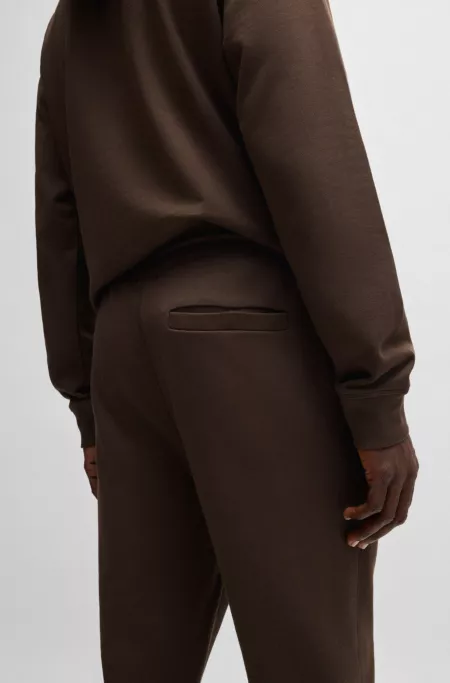 Cotton-terry tracksuit bottoms with logo patch