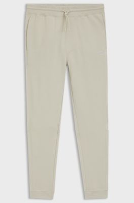Cotton-terry tracksuit bottoms with logo patch, Light Beige
