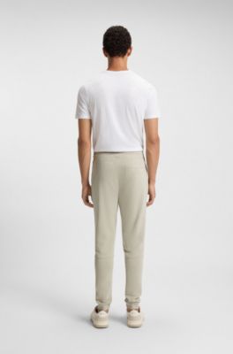 Cotton-terry tracksuit bottoms with logo patch, Light Beige