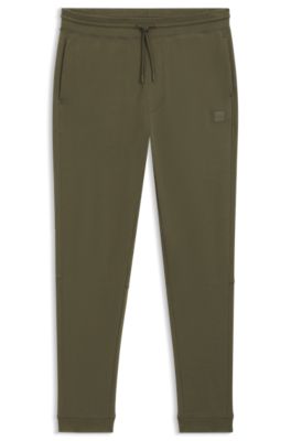 Cotton-terry tracksuit bottoms with logo patch, Olive