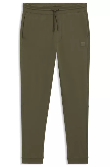 Cotton-terry tracksuit bottoms with logo patch