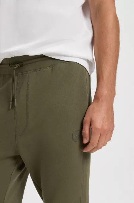Cotton-terry tracksuit bottoms with logo patch