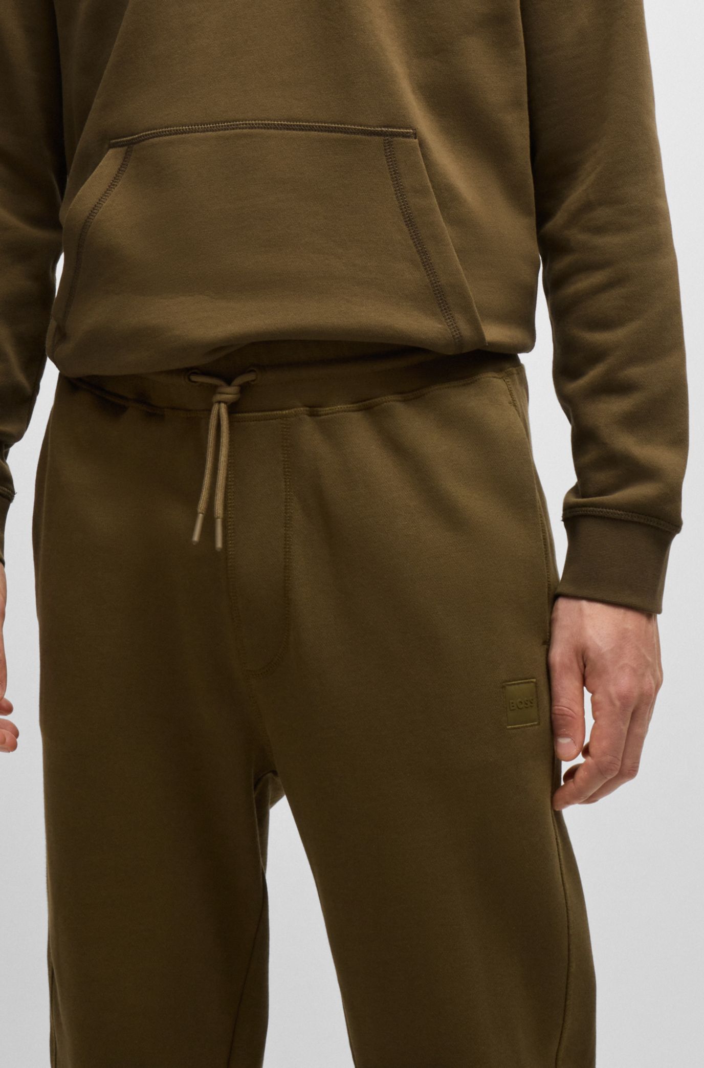 Cotton-terry tracksuit bottoms with logo patch