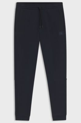 Cotton-terry tracksuit bottoms with logo patch, Dark Blue