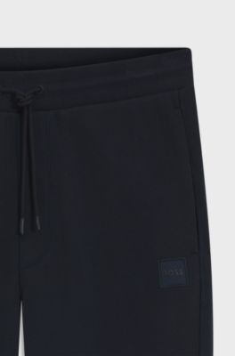 Cotton-terry tracksuit bottoms with logo patch, Dark Blue