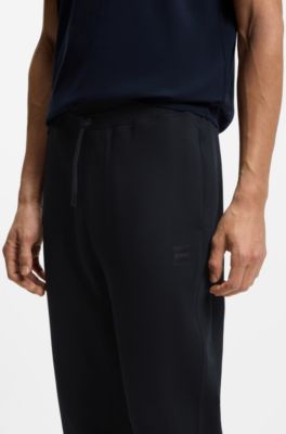 Cotton-terry tracksuit bottoms with logo patch, Dark Blue