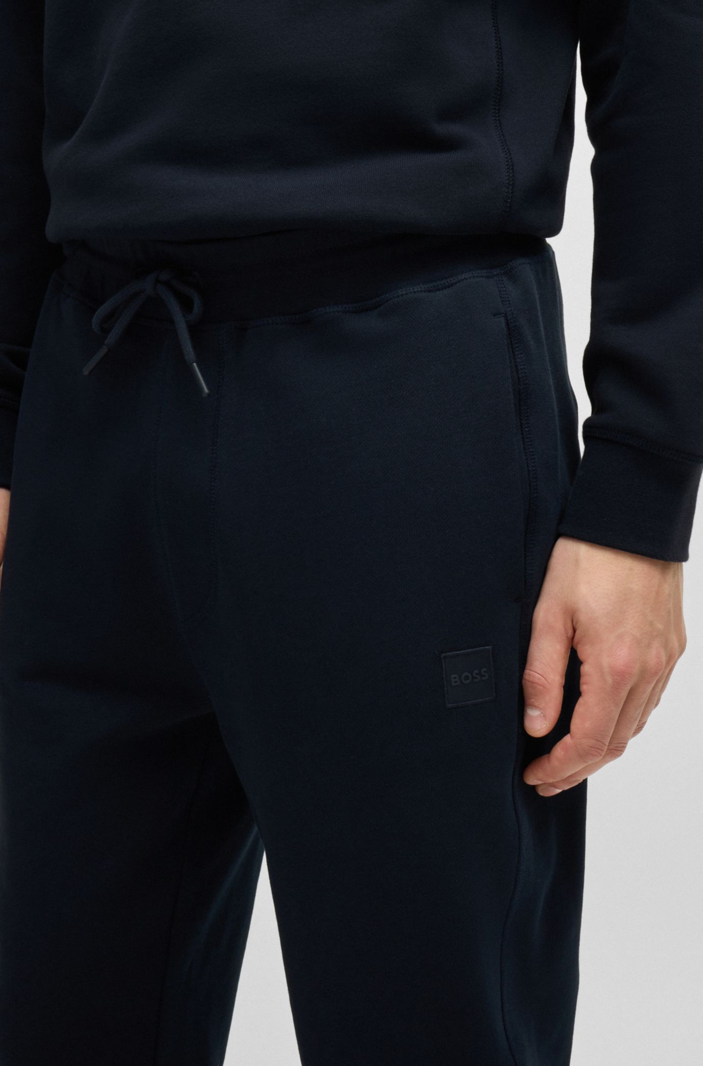 Cotton-terry tracksuit bottoms with logo patch