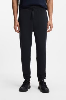 Cotton-terry tracksuit bottoms with logo patch, Dark Blue