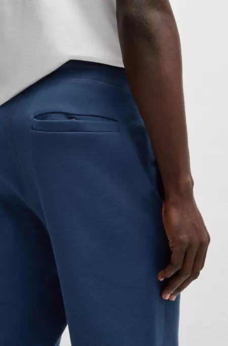 Cotton-terry tracksuit bottoms with logo patch