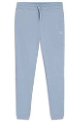 Cotton-terry tracksuit bottoms with logo patch, Light Blue