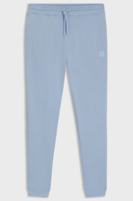 Cotton-terry tracksuit bottoms with logo patch, Light Blue
