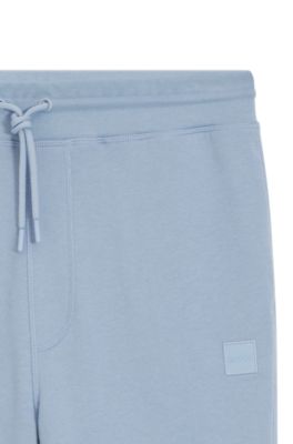 Cotton-terry tracksuit bottoms with logo patch, Light Blue