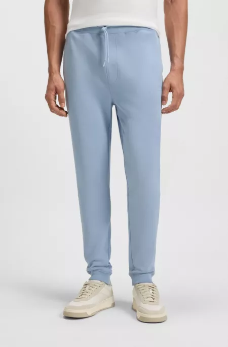 Bas de survêtement en molleton de coton avec patch logoté