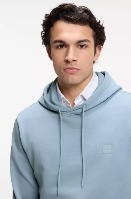 Sudadera con capucha en felpa de algodón con aplique de logo