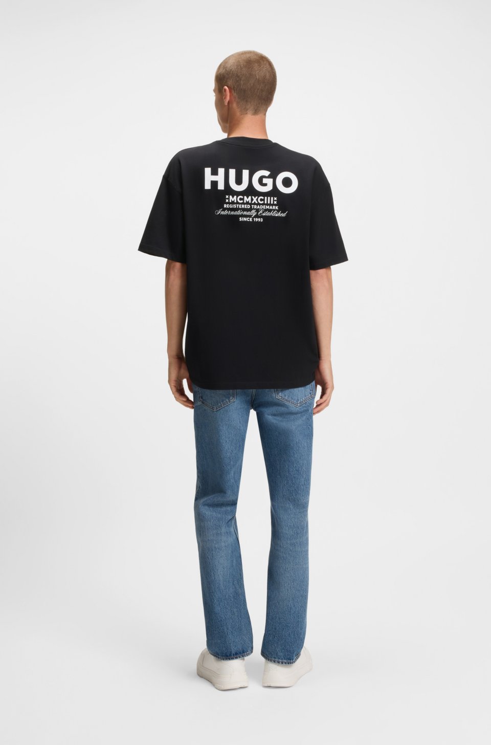 Loose-fit T-shirt in cotton with rear logo artwork