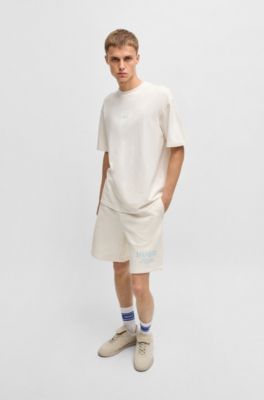 Loose-fit T-shirt in cotton with rear logo artwork, White