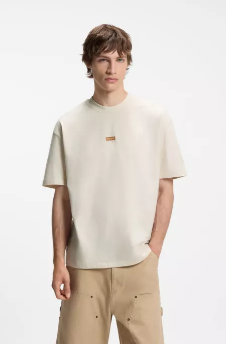 Loose-fit T-shirt in cotton with rear logo artwork