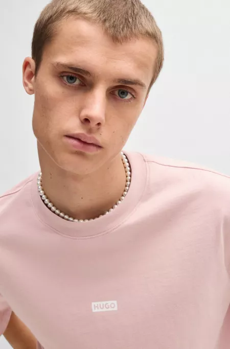 Loose-fit T-shirt in cotton with rear logo artwork