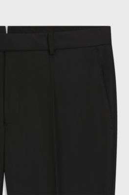 Pantalones de traje slim fit de lana virgen con el&aacute;stico, Negro