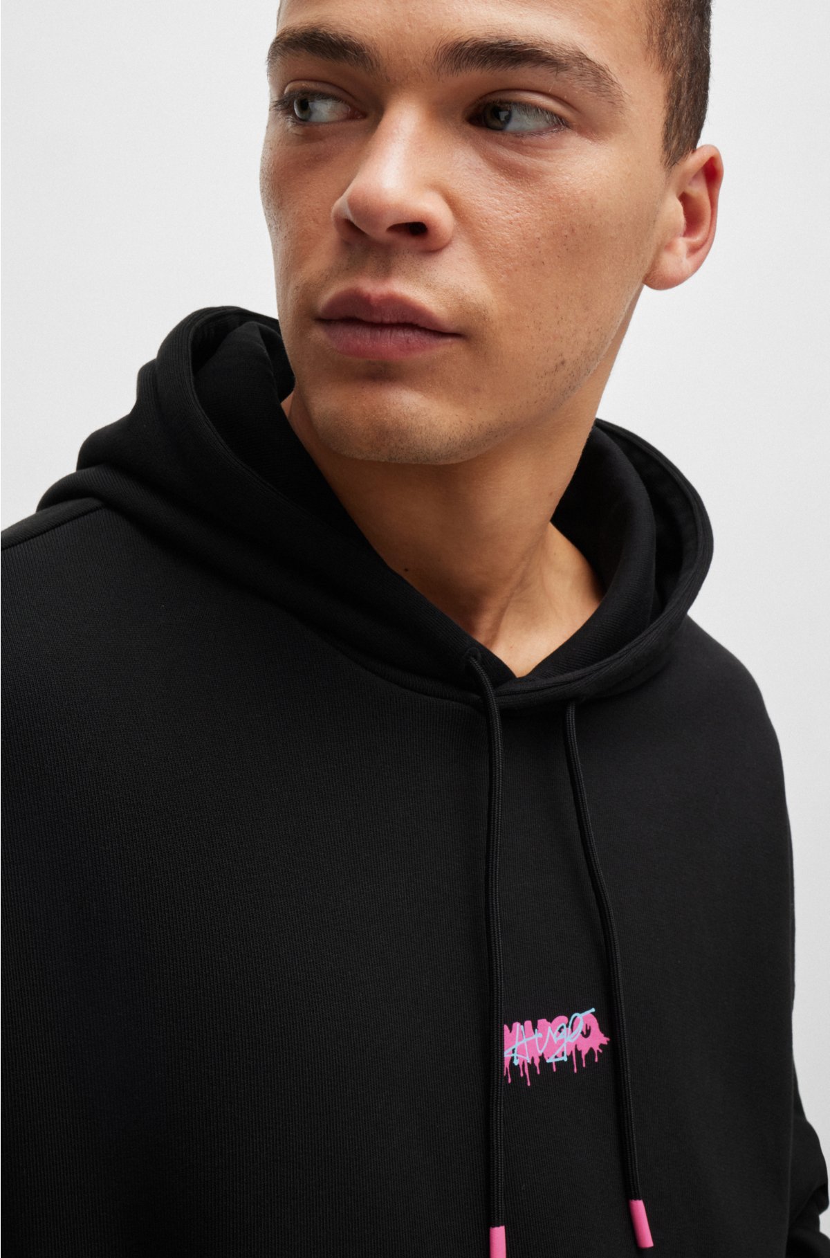 Cotton-terry oversized-fit hoodie with seasonal logos, Black