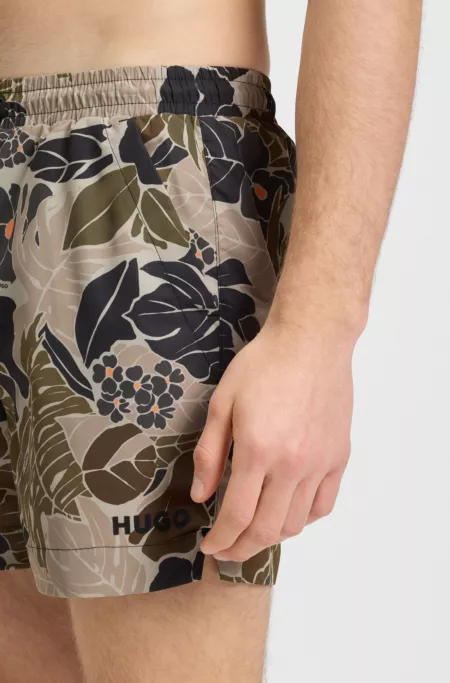 Quick-dry swim shorts with all-over print