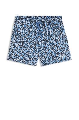 Quick-dry swim shorts with all-over print 1