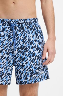 Quick-dry swim shorts with all-over print, Blue