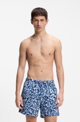 Quick-dry swim shorts with all-over print, Blue