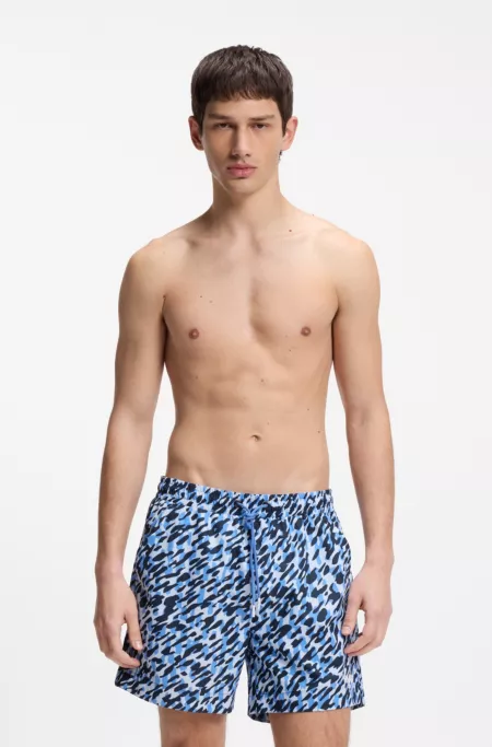 Quick-dry swim shorts with all-over print