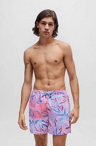 Fully lined swim shorts with seasonal print, light pink