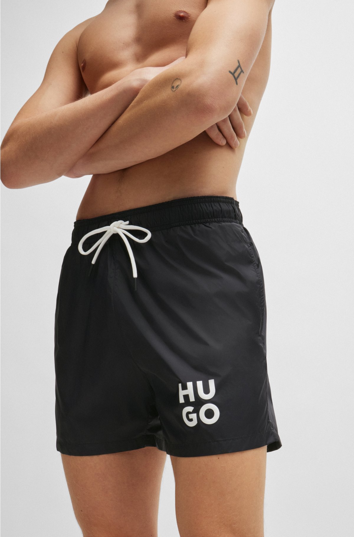 Quick-dry swim shorts with stacked-logo print, Black