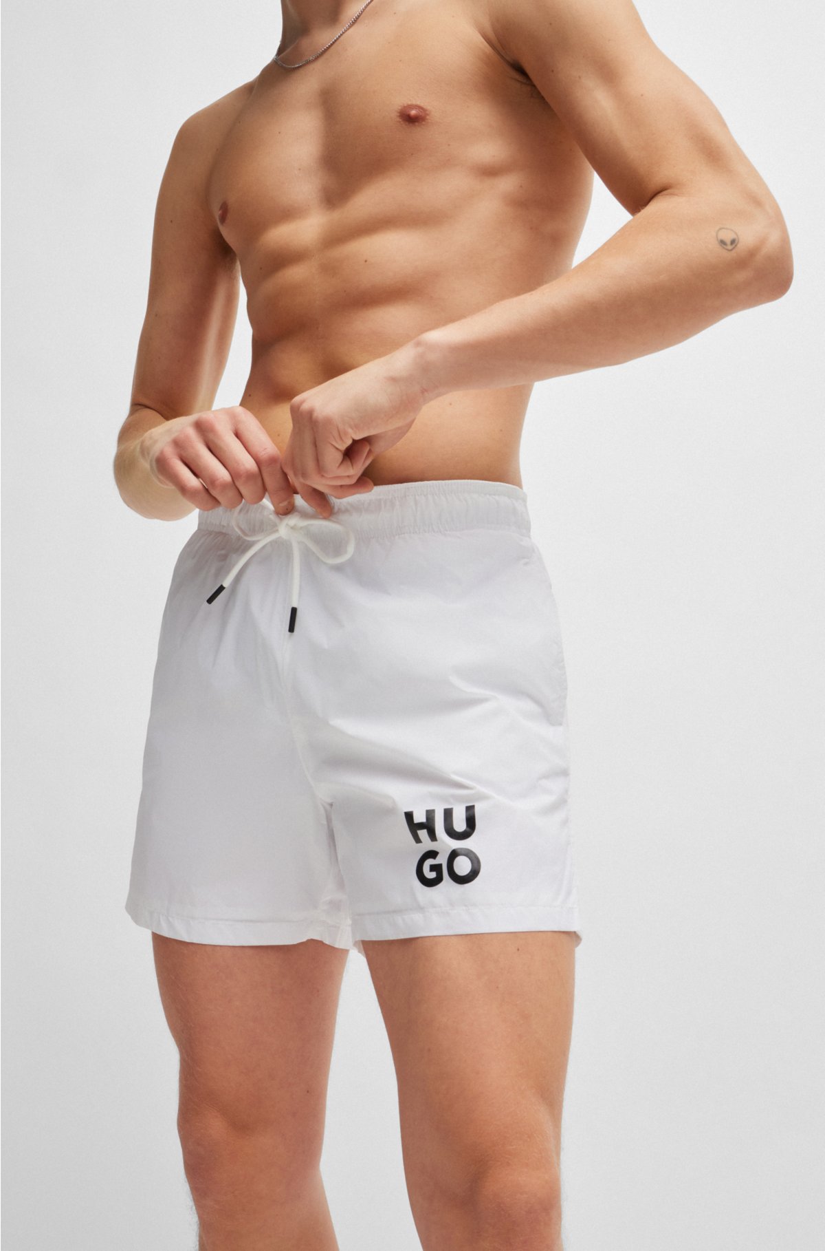 Quick-dry swim shorts with stacked-logo print, White