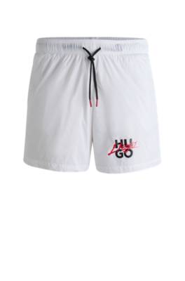 Shop Hugo Fully Lined Swim Shorts With Stacked Logo In White