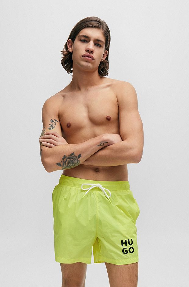 Quick-dry swim shorts with stacked-logo print, Yellow
