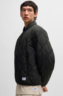 Water-repellent quilted jacket with logo badge, Black
