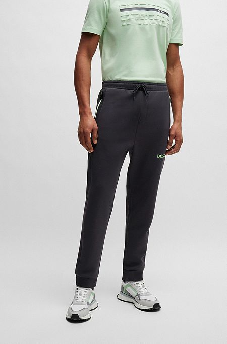 Tracksuit-bukser i bomuldsblanding med 3D-støbt logo, Sort