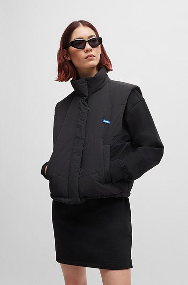 Water-repellent gilet with blue logo label, Black