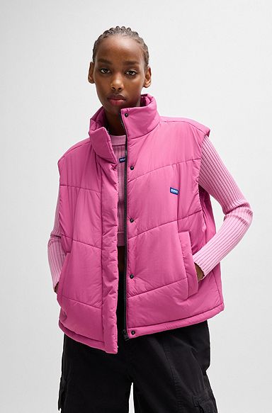 Water-repellent gilet with blue logo label, Pink